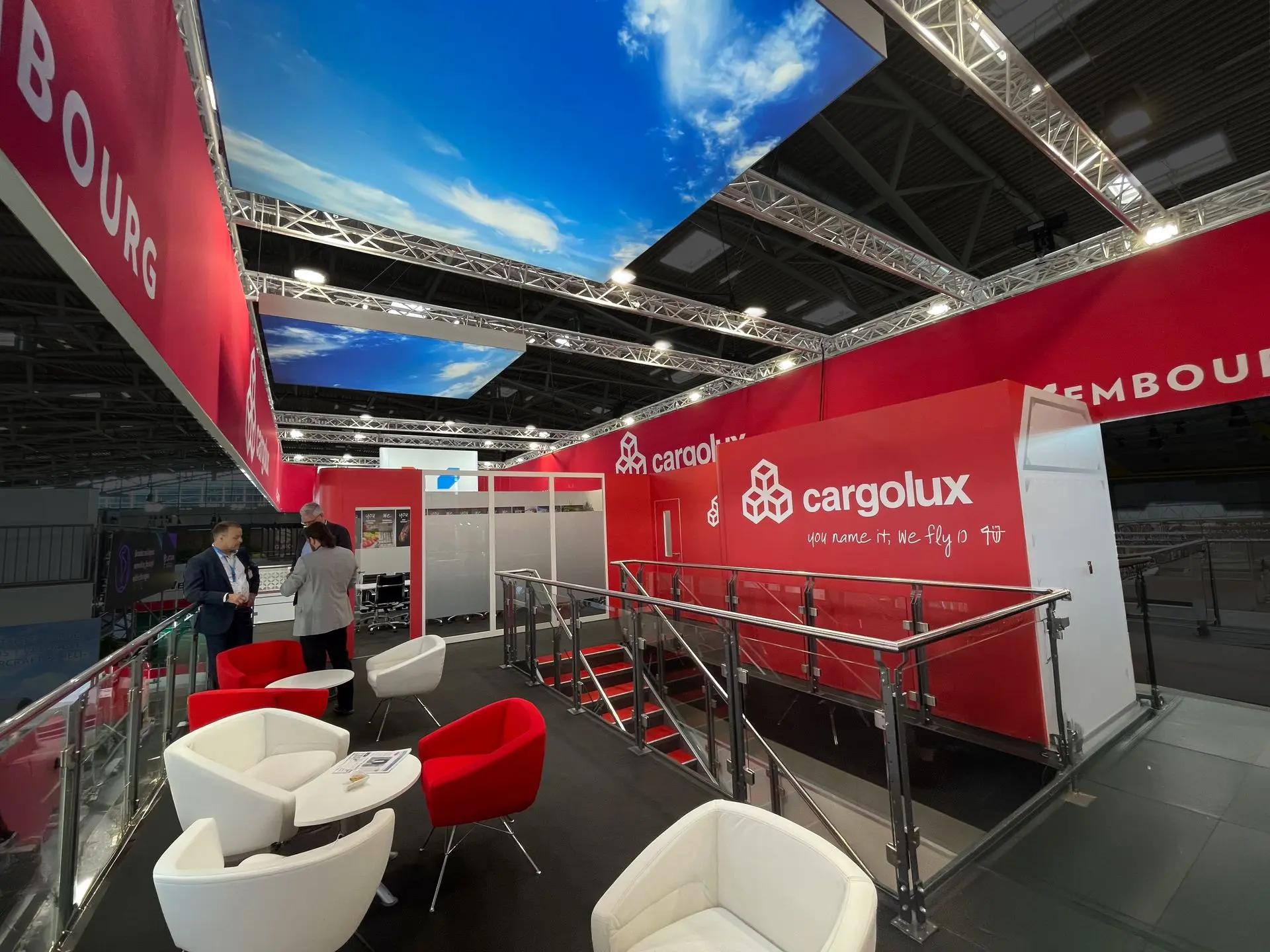 Doubel deck stand for Cargolux with lightboxes and corporate lounge furniture on transport and logistic