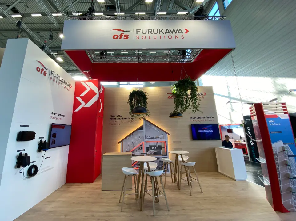 Sustainable hybrid booth for OFS at Angacom in Cologne