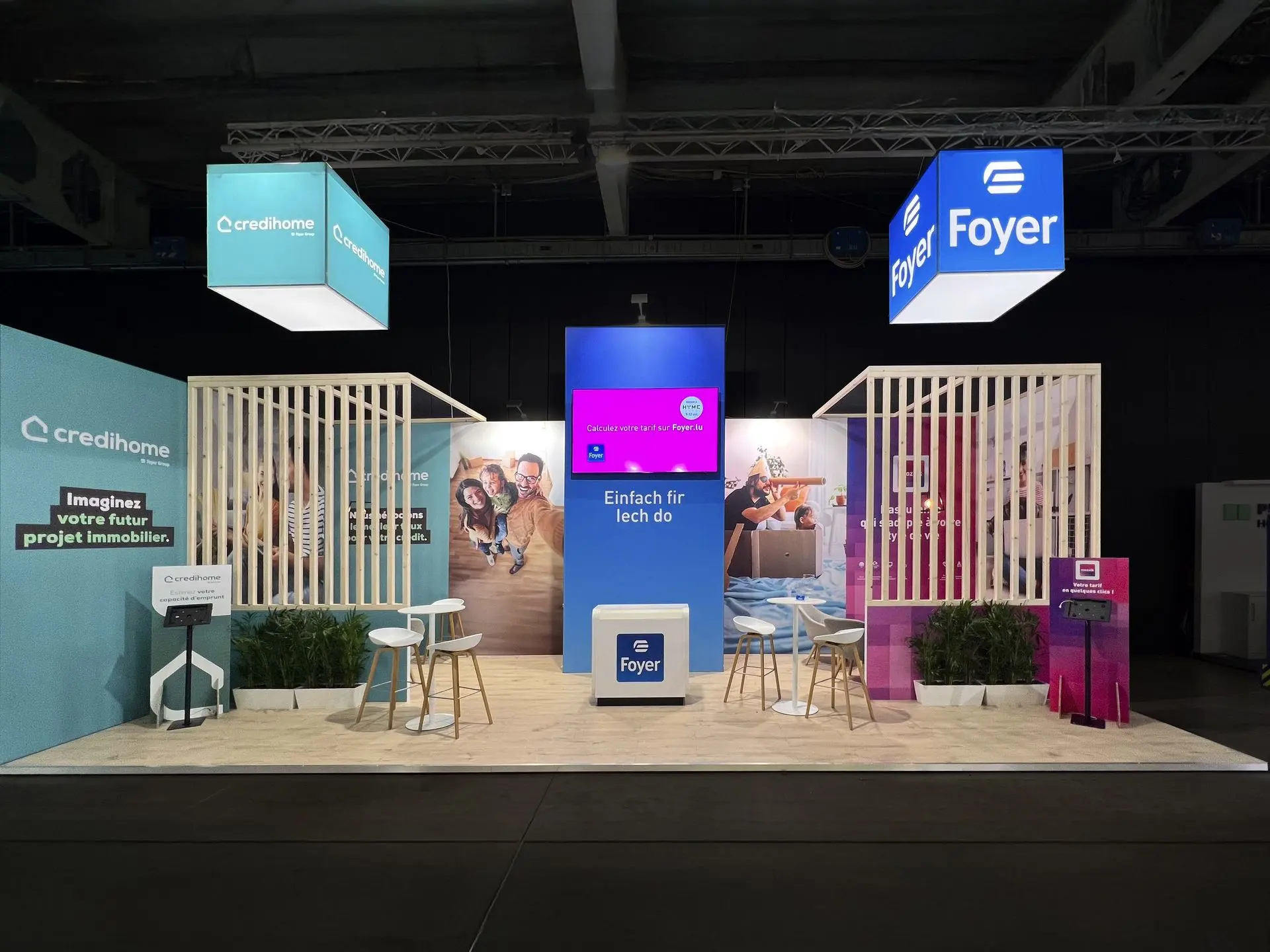 Custom made booth design for Foyer at Home Expo Luxembourg. Hybrid solution wooden separation elements for meeting rooms