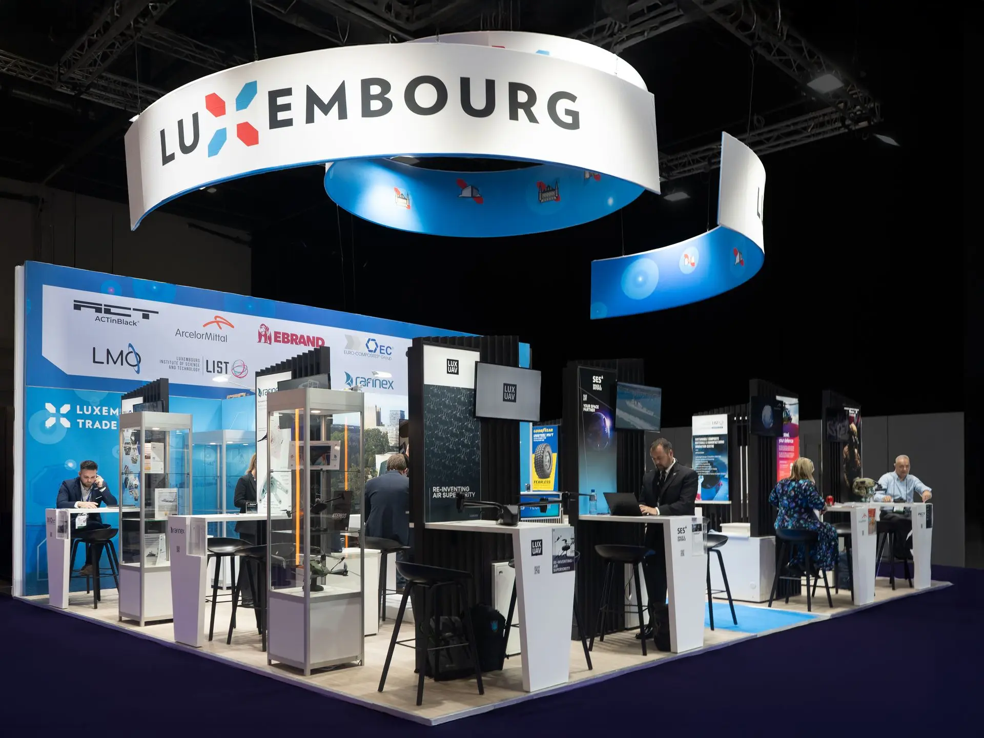 Cooperation booth with damngood with round structures and bematrix on DSEI London