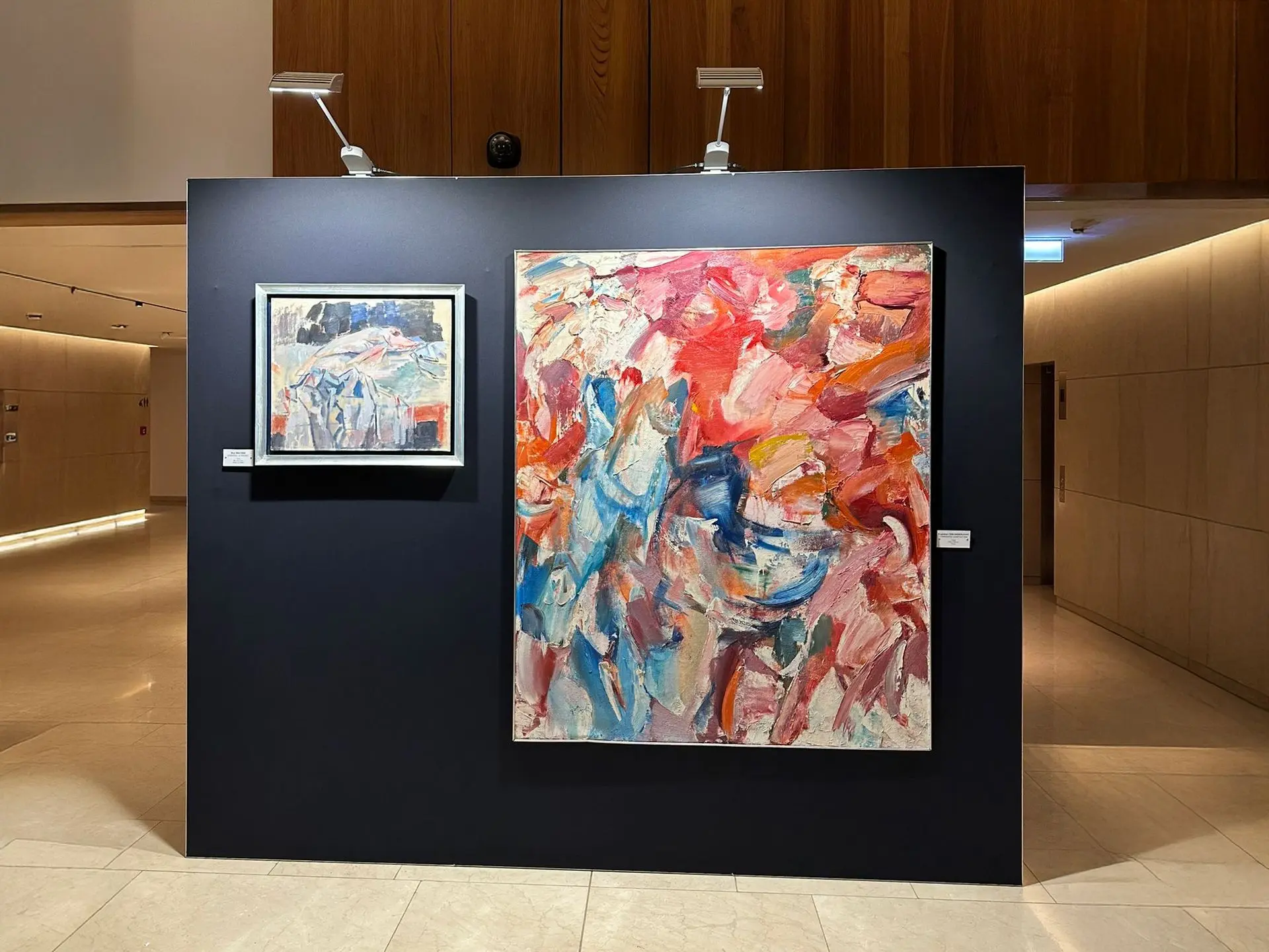 Bematrix wall covered with black fabric for showcase of artworks